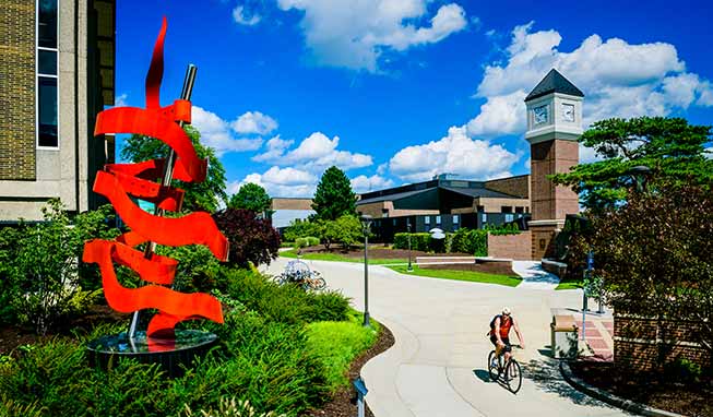 Downtown campus with the Red Ribbon sculpture and Clock Tower