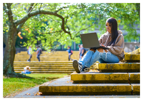Student sitting on steps